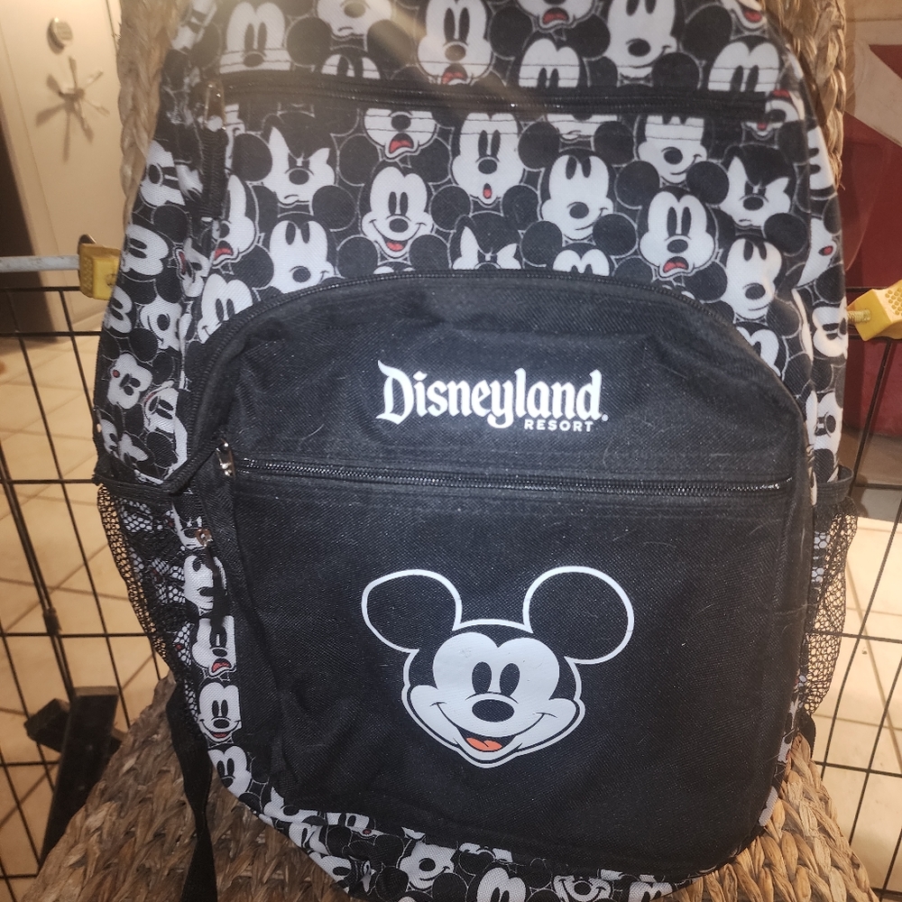 Disney Parks Disneyland Backpack with Mickey Mouse faces.